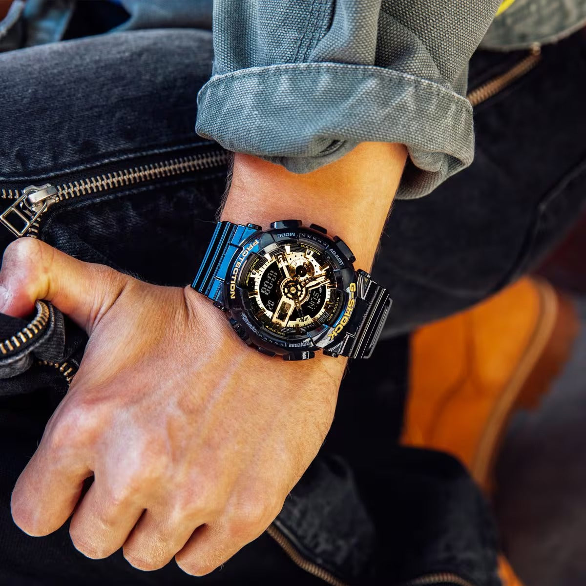 Men's Casio G-Shock Classic Resin Strap Watch with Black and Gold-Tone Dial (Model: GA110GB-1A)